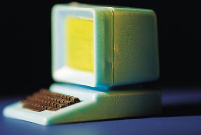 Image of computer terminal on desk signifying the need for asset management controls.