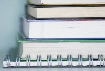 Image of a stack of school books depicting disaster recovery basics.