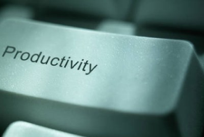 Image of computer key with the word 'productivity', depicting the need to define end user project roles.