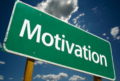Image of road sign with the word 'motivation' signifying the need to motivate project teams.