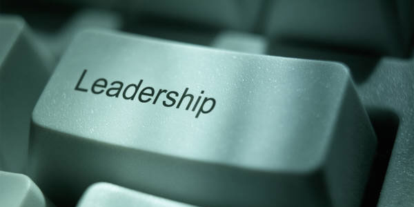 Image of computer key labeled 'leadership' signifying the need to manage crisis perceptions.