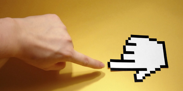 Image of persons finger and cursor hand pointing to each other signifying the need to employ technology standards.