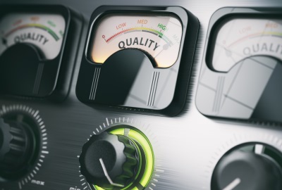 Image of control panel meter labeld 'quality' depicting the need to evaluate the cost of quality in projects.